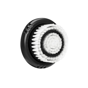 The Soniclear Face Brush (v.2) by Michael Todd Beauty features a round antimicrobial brush head with white bristles and a black circular pattern, set on a black base, designed for daily facial cleansing and pore unclogging. Shown on a white background.