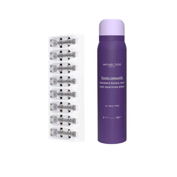 A purple can of Michael Todd Beauty Dermaplaning Essentials Kit stands next to a pack of replacement razor blades arranged in two rows.
