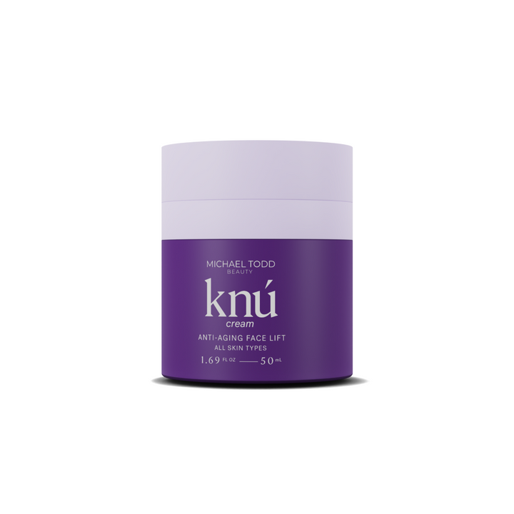 A purple and white container with white text - Knú Cream - Free Gift by Michael Todd Beauty.
