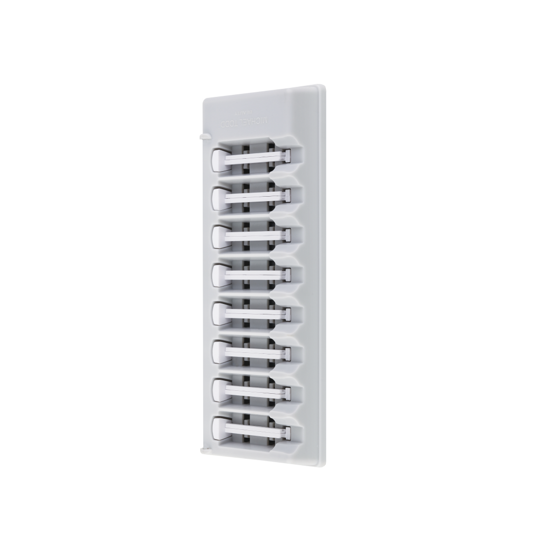 A white rectangular plastic panel with ten evenly spaced clips in two columns, perfect for organizing cables or similar items, and designed with medical grade Sonicsmooth Refill Tips by Michael Todd Beauty for secure home use. 2 Month Supply