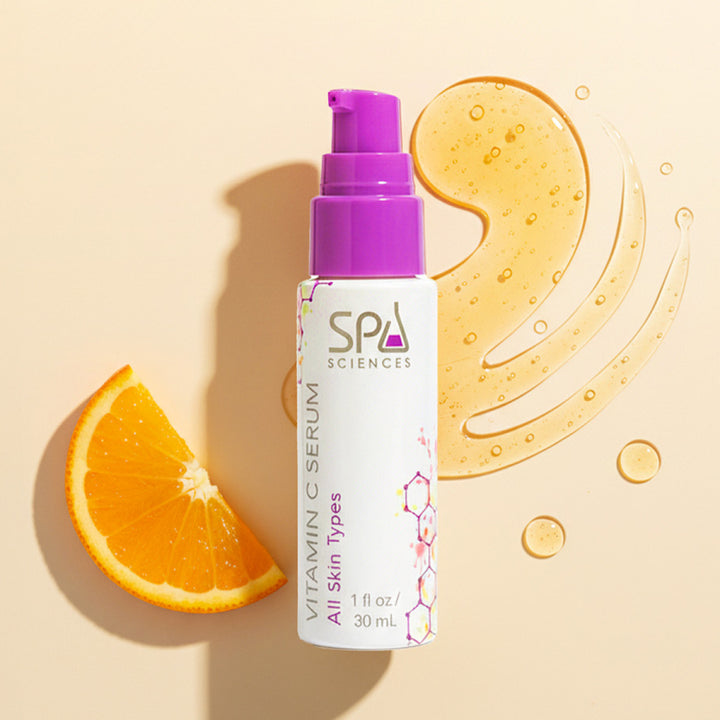 A bottle of Michael Todd Beauty Radiance Reclaimed Vitamin C Brightening Serum with a purple pump, shown beside a serum smear and orange slice on beige, highlights its potent antioxidant and anti-aging benefits.
