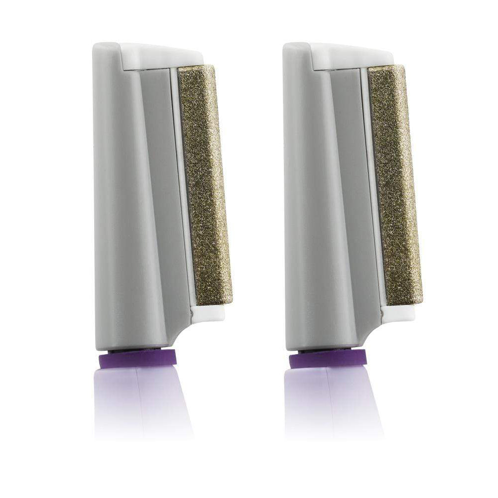 Two gray kitchen sponges with purple bases standing upright.